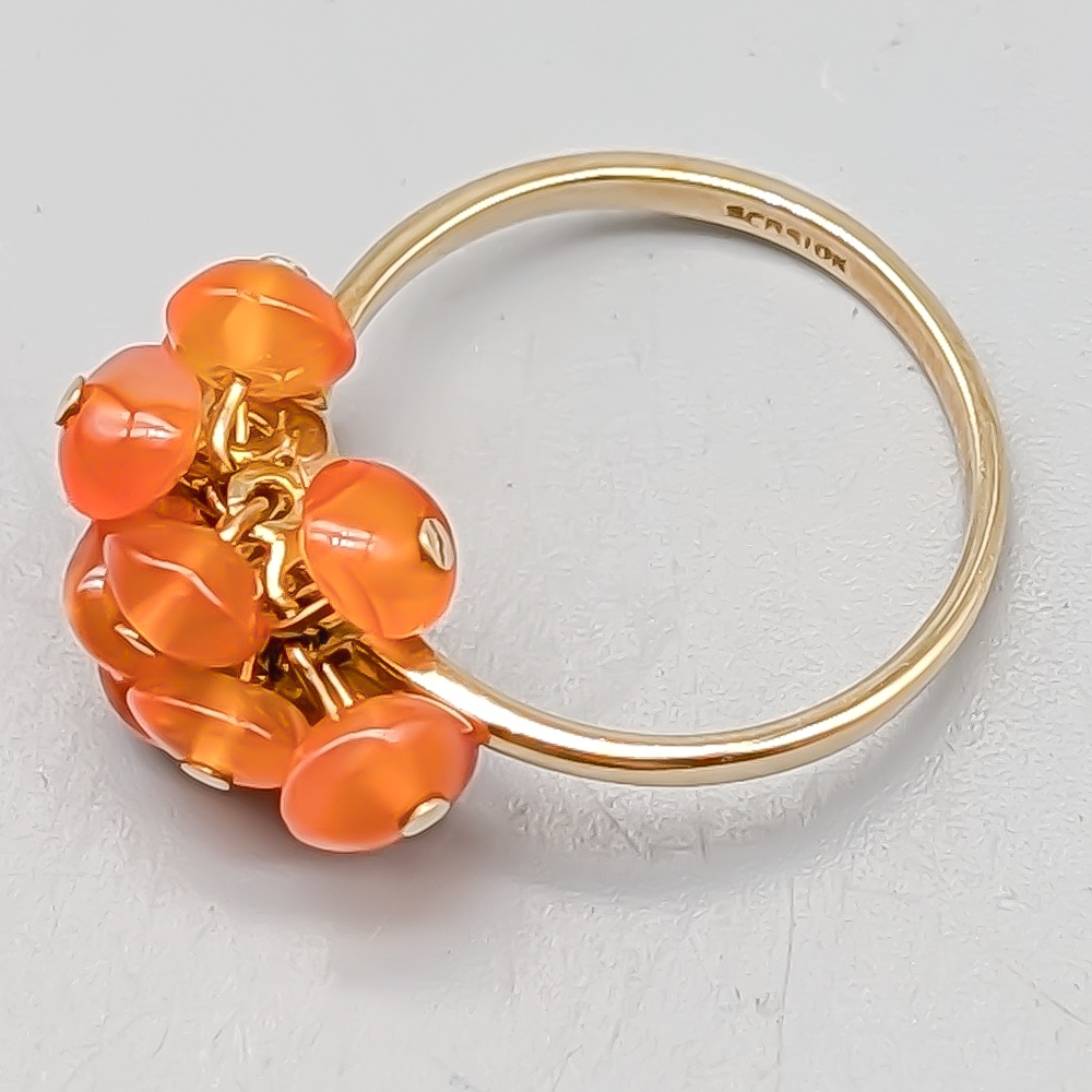 Ring i Guld med Orange Stenar-0