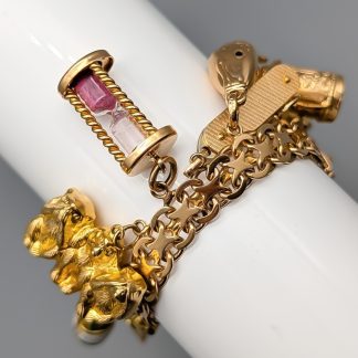 19cm X-Länk i Guld med Berlocker 18K 63.67g