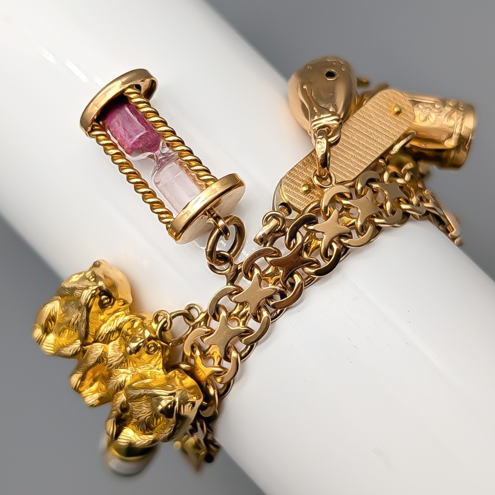 19cm X-Länk i Guld med Berlocker 18K 63.67g