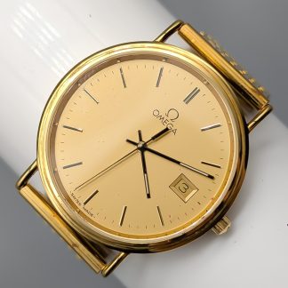 Omega Guldklocka 18K 69.83g 19.4cm