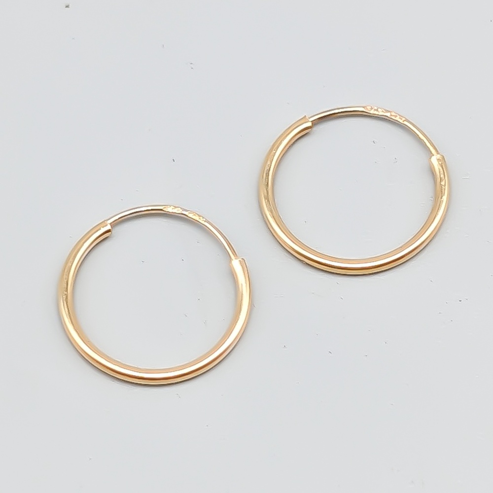 Creoler i Guld 18K 0.23g 12mm