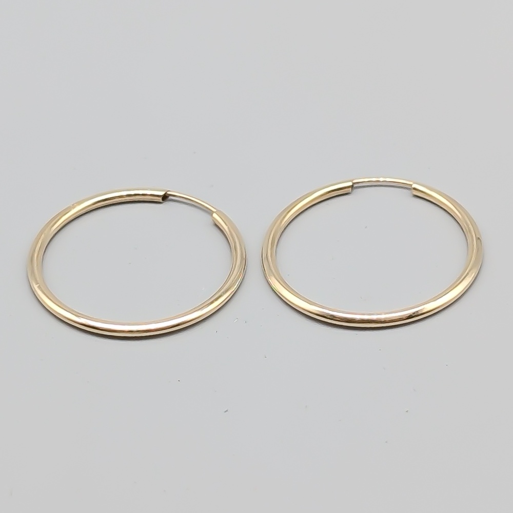Creoler i Guld 9K 0.67g 26mm - Bild 2