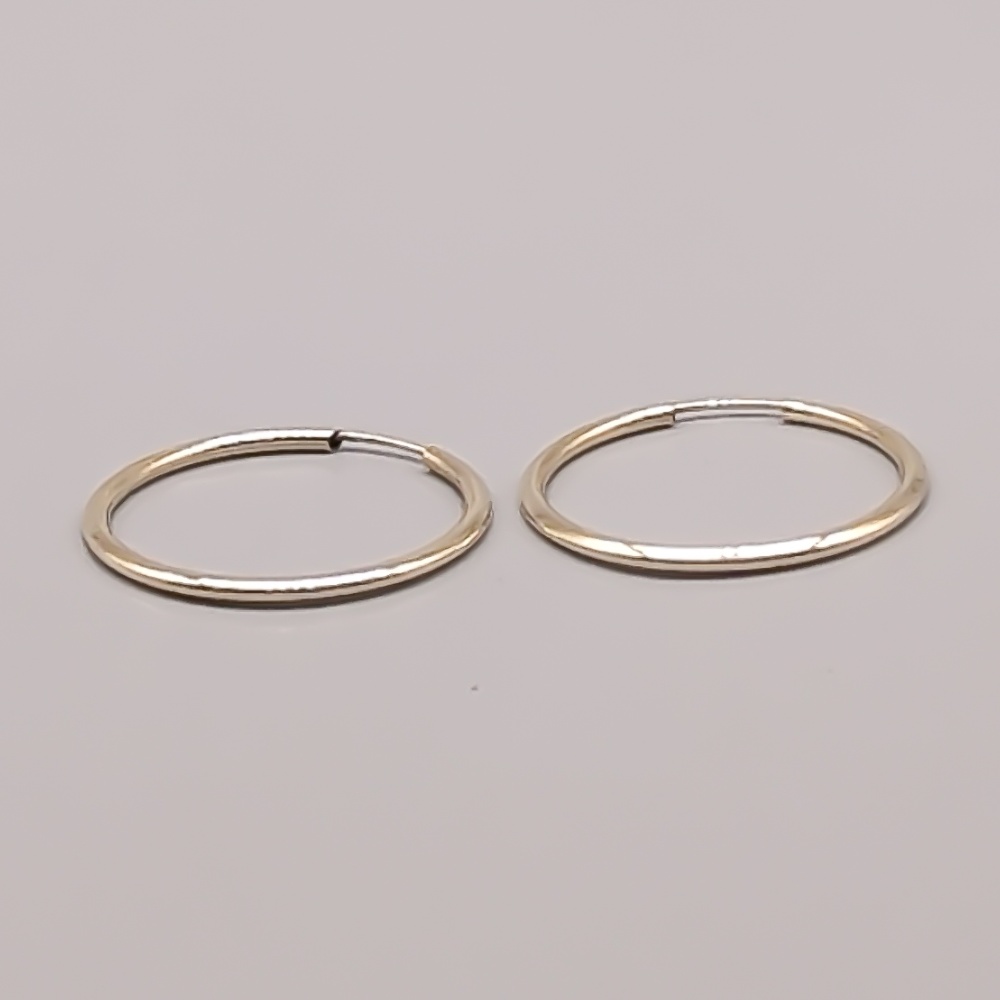 Creoler i Guld 9K 0.67g 26mm