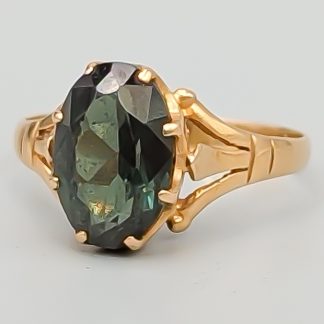 Ring i Guld med Grön Sten 14K 3.09g 19mm