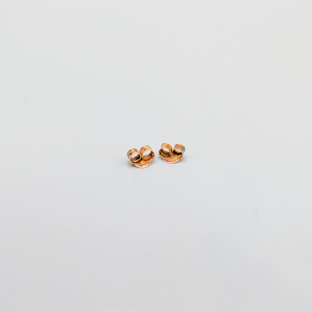 2 st Örhängestopp i Guld 18K 0.22g